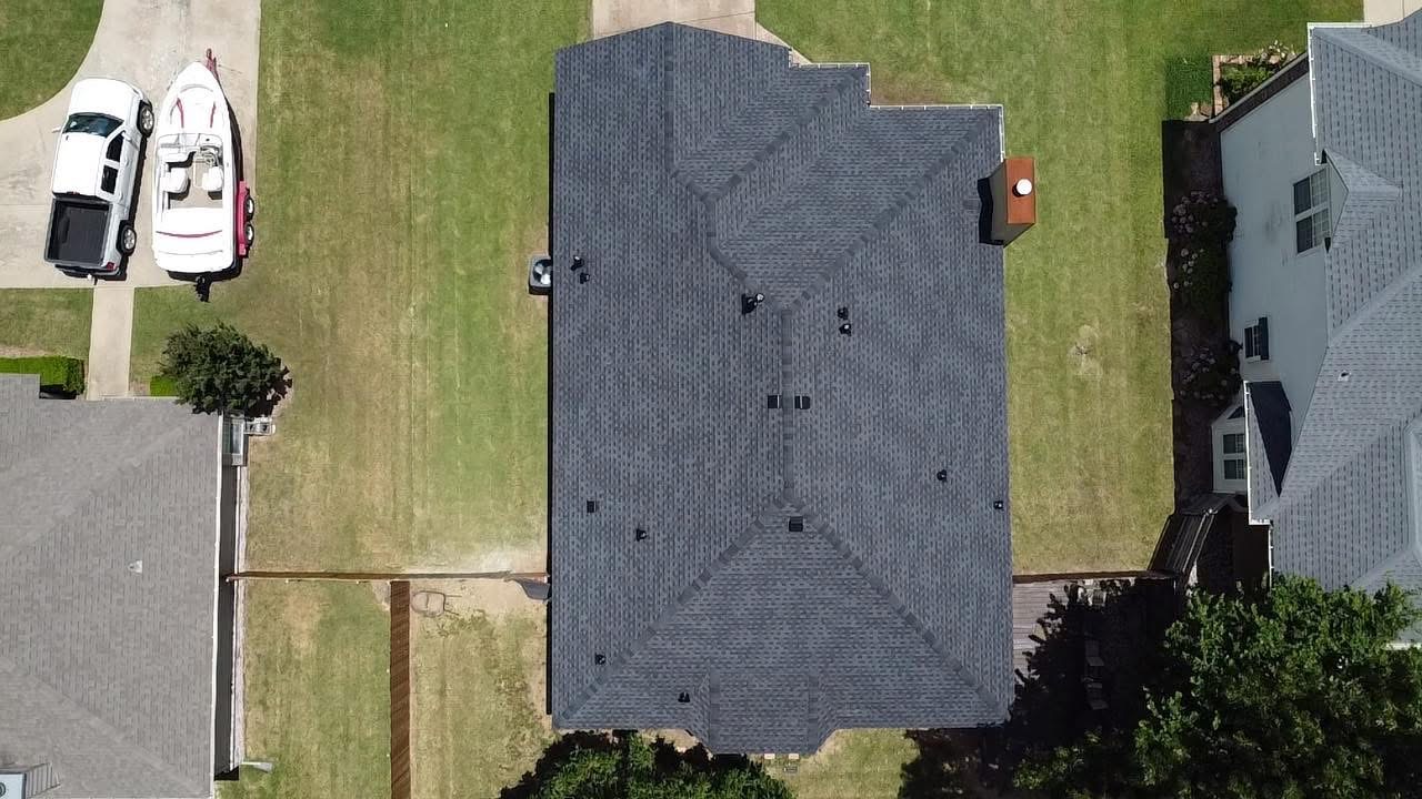 Overhead view of completed shingle roof